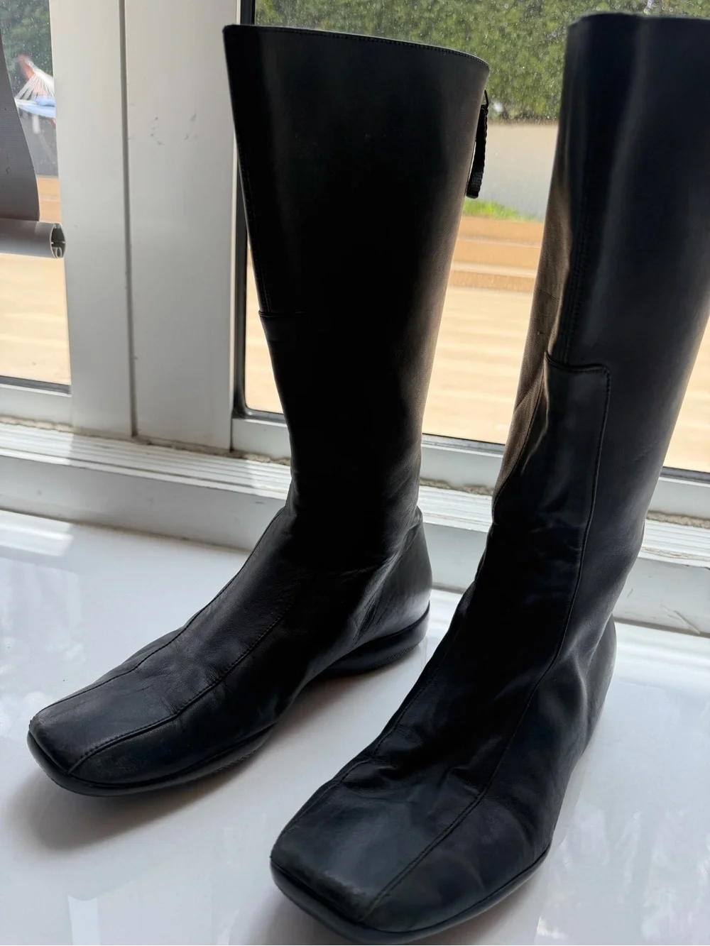 Prada Black Leather Over-The-Knee Boots with Red Heel Tab